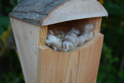 Nest box material depot